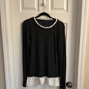 Black Ribbed Sweater with White Ruffle Hem